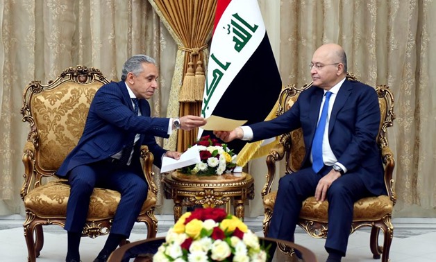 Egyptian Ambassador to Iraq Alaa Mousa (l) and President of Iraq Barham Saleh in Salam Castle in Baghdad, Iraq. January 5, 2019. Press Photo 
