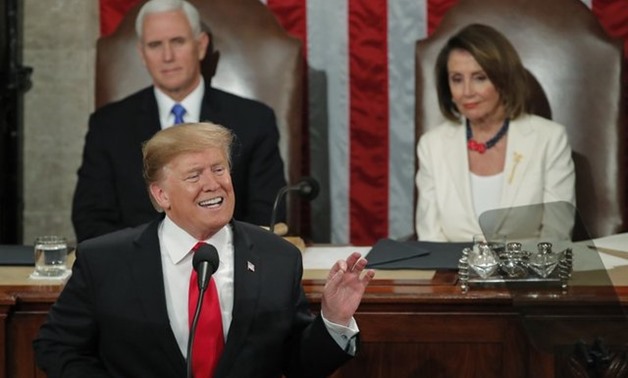 U.S. President Donald Trump gestures during his State of the Union address to a joint session of Congress on Capitol Hill in Washington, U.S., February 5, 2019. REUTERS/Jim Young
