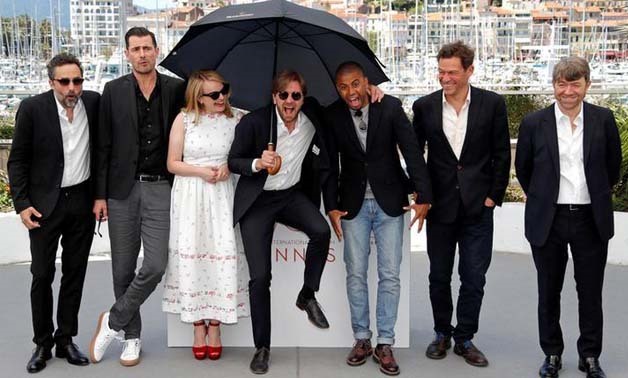70th Cannes Film Festival - Photocall for the film 'The Square' (L-R) Producer Erik Hemmendorff, cast members Claes Bang, Elisabeth Moss, director Ruben Ostlund, cast members Christopher Læsso, Dominic West and producer Philippe Bober pose -  REUTERS/Eric