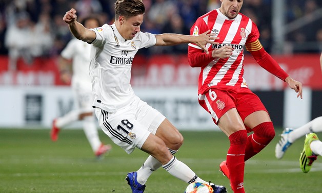 FILE PHOTO: Real Madrid's Marcos Llorente in action with Girona's Alex Granell at Montilivi, Girona, Spain - January 31, 2019. REUTERS/Albert Gea/File Photo
