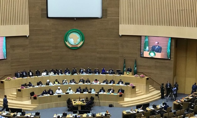 FILE - President Abdel Fatah al-Sisi receives chairmanship of the African Union from Rwandan president