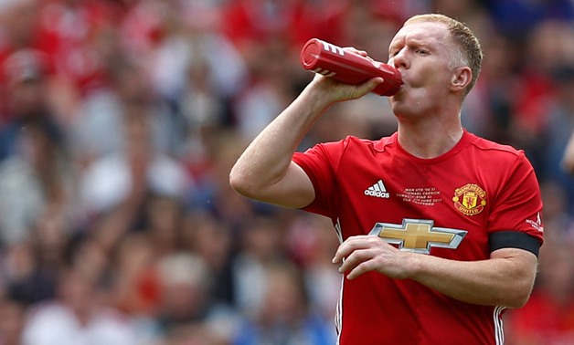 FILE PHOTO: Britain Football Soccer - Manchester United 2008 XI v Michael Carrick All-Stars - Michael Carrick Testimonial - Old Trafford - June 4, 2017 Manchester United '08 XI's Paul Scholes drinks during the game Action Images via Reuters / Ed Sykes/Fil