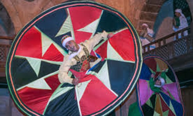 FILE - Folkloric Tanoura Dance