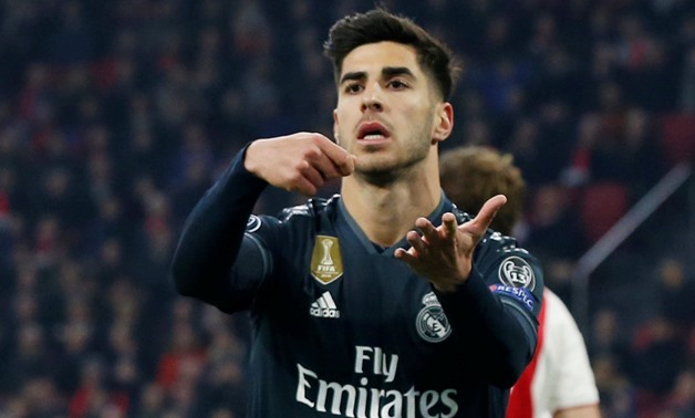 Soccer Football - Champions League Round of 16 First Leg - Ajax Amsterdam v Real Madrid - Johan Cruijff Arena, Amsterdam, Netherlands - February 13, 2019 Real Madrid's Marco Asensio celebrates scoring their second goal REUTERS/Eva Plevier

