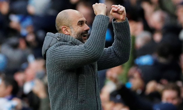 Soccer Football - Premier League - Manchester City v Chelsea - Etihad Stadium, Manchester, Britain - February 10, 2019 Manchester City manager Pep Guardiola celebrates their second goal scored by Manchester City's Sergio Aguero REUTERS/Phil Noble EDITORIA