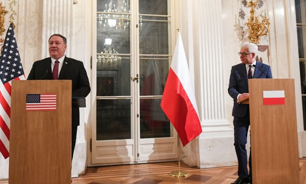Janek Skarzynski, AFP | Polish Foreign Minister Jacek Czaputowicz (R) and US Secretary of State Mike Pompeo give a joint press conference on February 12, 2019 in Warsaw.
