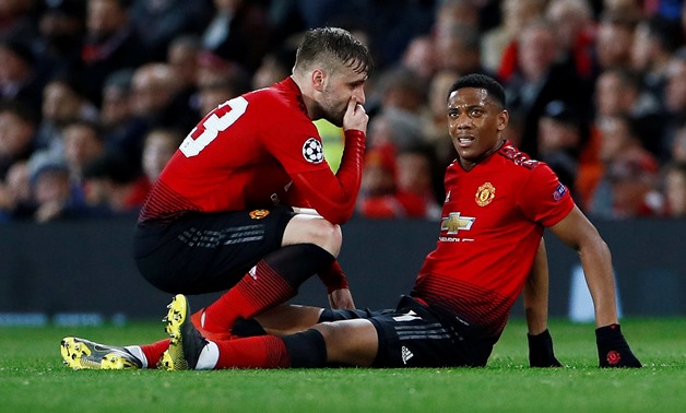 FILE PHOTO: Manchester United's Anthony Martial after sustaining an injury, with Luke Shaw Old Trafford, Manchester, Britain - Feb 12, 2019. Action Images via Reuters/Jason Cairnduff/File Photo

