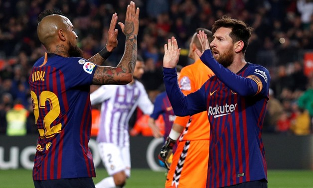 February 16, 2019 Barcelona's Lionel Messi celebrates scoring their first goal with Arturo Vidal REUTERS/Albert Gea