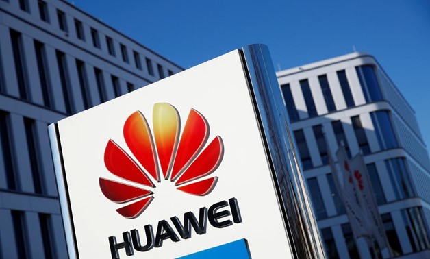 FILE PHOTO: The logo of Huawei Technologies is pictured in front of the German headquarters of the Chinese telecommunications giant in Duesseldorf, Germany, February 18, 2019. REUTERS/Wolfgang Rattay/File Photo

