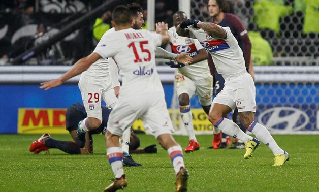 Lyon, France - January 21, 2018 Lyon's Memphis Depay celebrates scoring their second goal with team mates REUTERS/Emmanuel Foudrot
