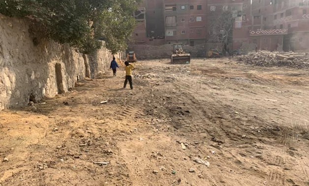FILE- Bulldozer removes slums in the vicinity of Jewish cemeteries of Bassatine in Cairo- Photo courtesy of the Jewish Community in Cairo’s Facebook page.