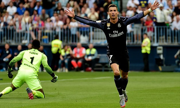 Real Madrid's forward Cristiano Ronaldo celebrates after scoring against Malaga on May 21, 2017 - AFP 
