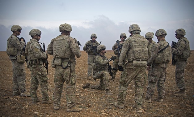 U.S. forces gather in a joint patrol rehearsal in Manbij, Syria, in November.Spc. Zoe Garbarino / U.S. Army via AP