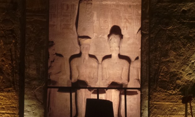 FILE- Sun illuminates four statues of King Ramses II seated at the top of Abu Simbel temple- Egypt TodayAbdullah Salah