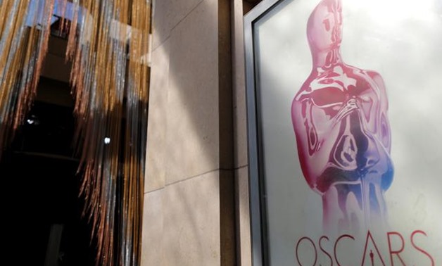 An Oscars poster is seen at the entrance to the Dolby Theatre as preparations continue for the 91st Academy Awards in Hollywood, Los Angeles, California, U.S., February 23, 2019. REUTERS/Lucy Nicholson.