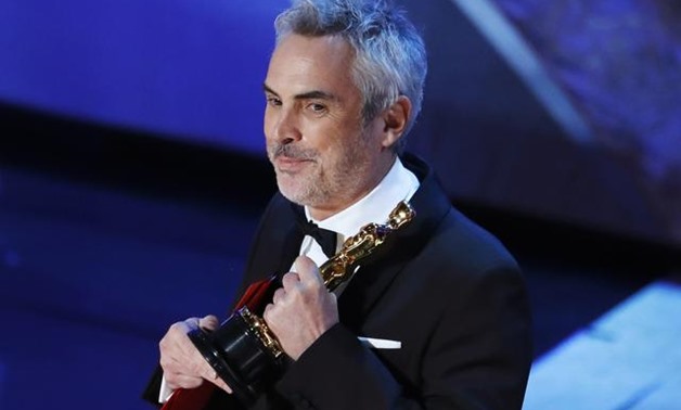 91st Academy Awards - Oscars Show - Hollywood, Los Angeles, California, U.S., February 24, 2019. Alfonso Cuaron accepts the Foreign Language Film award for "Roma". REUTERS/Mike Blake.