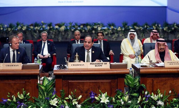 Egypt's President Abdel-Fattah El-Sisi, center, chairs a meeting at an EU-Arab summit at the Sharm El Sheikh convention center in Sharm El Sheikh, Egypt, Sunday, Feb. 24, 2019. Leaders from European Union and Arab League countries are holding their first-