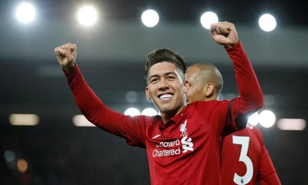Liverpool's Roberto Firmino celebrates scoring their fifth goal. REUTERS/Phil Noble 