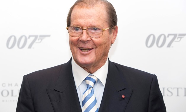 Actor Sir Roger Moore attends the 50 Years of James Bond Auction at Christies - REUTERS/Neil Hall