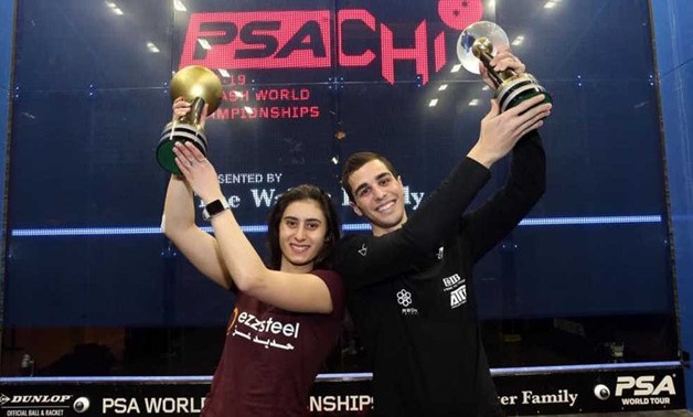 Ali Farag & Nour El Sherbiny with the World title - FILE