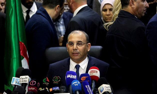 Abdelghani Zaalane, campaign manager of President Abdelaziz Bouteflika speaks after he submitted Bouteflika's official election papers at the Constitutional Council in Algiers