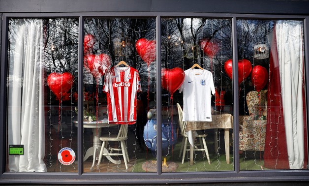 Soccer Football - Funeral of Gordon Banks - Stoke Minster, Stoke-upon-Trent, Britain - March 4, 2019 Tributes are seen in a shop window before the funeral of former England World Cup winning goalkeeper Gordon Banks REUTERS/Phil Noble
