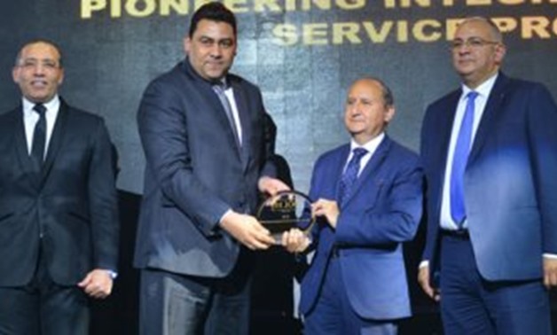 Adel Hamed, CEO Telecom Egypt CEO, WE, received the bt100 crystal award on behalf of WE for being a pioneering integrated telecom service provider.