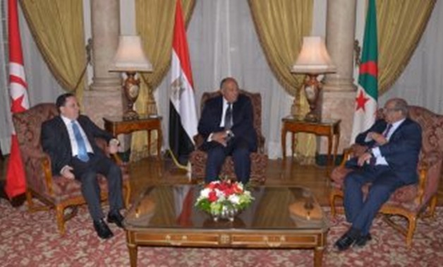 Egyptian Foreign Minister Sameh Shokry, Tunisian Foreign Minister Khamis al-Johainawy (l), and Algerian Foreign Minister Abdel Kader Mosahel (r) in a Tripartite Meeting on Libya held in Cairo, Egypt. March 6, 2019. Press Photo 