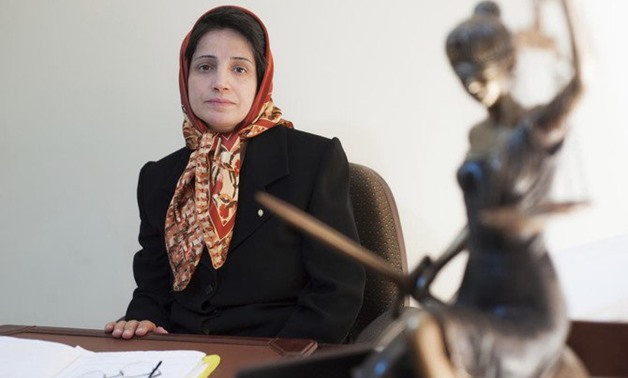 Iranian human rights lawyer Nasrin Sotoudeh, a prominent human rights lawyer in Iran who defended women protesting against the Islamic Republic’s mandatory headscarf, has been convicted and faces years in prison. (AP/Arash Ashourinia)