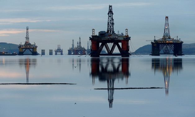 FILE PHOTO: Drilling rigs are parked up in the Cromarty Firth near Invergordon, Scotland, Britain January 27, 2015. REUTERS/Russell Cheyne