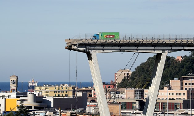 FILE PHOTO: The collapsed Morandi Bridge is seen in the Italian port city of Genoa, Italy August 15, 2018. REUTERS/Stefano Rellandini/