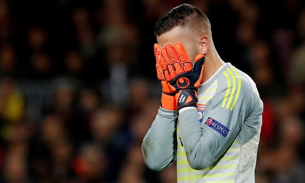 FILE PHOTO: Soccer Football - Champions League - Round of 16 Second Leg - FC Barcelona v Olympique Lyonnais - Camp Nou, Barcelona, Spain - March 13, 2019 Lyon's Anthony Lopes reacts as he is substituted off after sustaining an injury REUTERS/Susana Vera/F