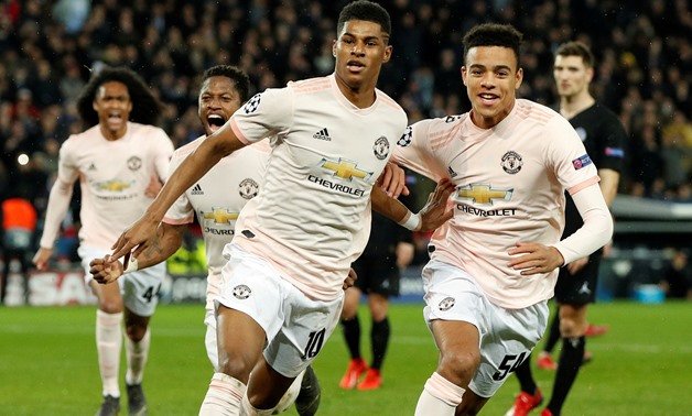 FILE PHOTO: Soccer Football - Champions League - Round of 16 Second Leg - Paris St Germain v Manchester United - Parc des Princes, Paris, France - March 6, 2019 Manchester United's Marcus Rashford celebrates scoring their third goal with Mason Greenwood a