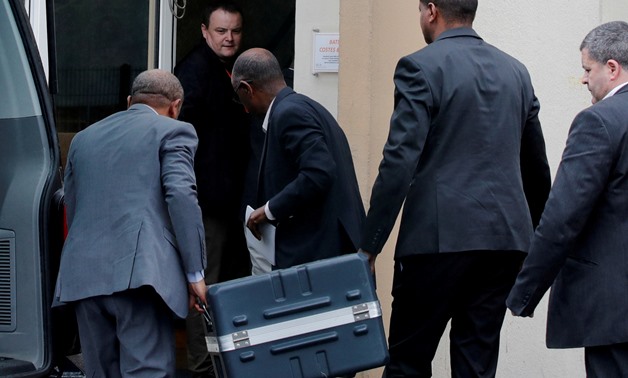 FILE PHOTO: Men unload a case containing the black boxes from the crashed Ethiopian Airlines Boeing 737 MAX 8 outside the headquarters of France's BEA air accident investigation agency in Le Bourget, north of Paris, France, March 14, 2019. REUTERS/Philipp