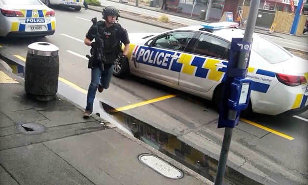 A police officer responds following shooting at Linwood in Christchurch, New Zealand, March 15, 2019, in this still image obtained from a social media video. Video obtained by Reuters/ via REUTERS