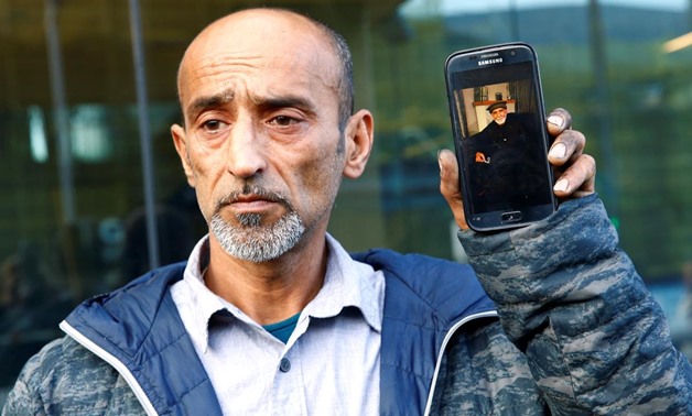 Omar Nabi speaks to the media about losing his father Haji Daoud in the mosque attacks, at the district court in Christchurch, New Zealand, March 16, 2019. REUTERS/Edgar Su