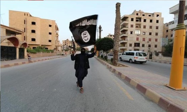 A member loyal to the Islamic State Reuters