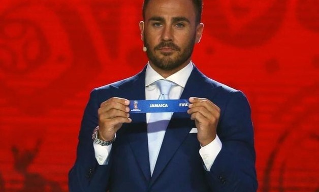 Italian coach Fabio Cannavaro holds up the slip showing "Jamaica" during the preliminary draw for the 2018 FIFA World Cup at Konstantin Palace in St. Petersburg, Russia July 25, 2015. REUTERS/Stringer
