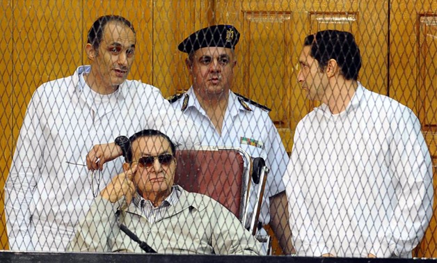 Gamal Mubarak (left), former President Mohamed Hosni Mubarak (middle) and Alaa Mubarak (right) - File photo