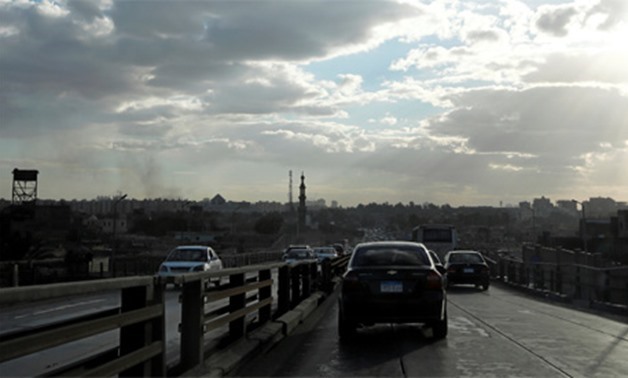 Weather. Vehicles drive during rush hour over El Sayeda Aisha Bridge near Al-Qalaa
