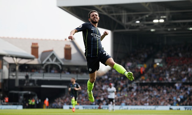 Soccer Football - Premier League - Fulham v Manchester City - Craven Cottage, London, Britain - March 30, 2019 Manchester City's Bernardo Silva celebrates scoring their first goal REUTERS/David Klein EDITORIAL USE ONLY. No use with unauthorized audio, vid