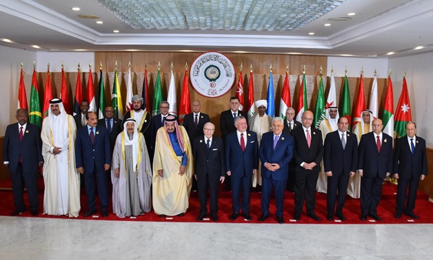Arab leaders pose for a picture at the 30th Arab Summit in Tunis- press photo