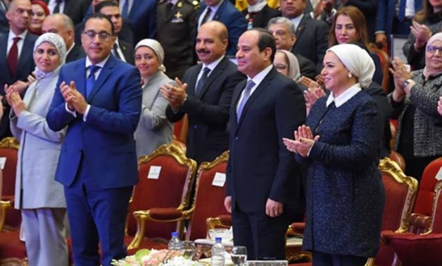 President Abdel Fatah al-Sisi and Egypt's first lady along with a number of officials celebrate the Egyptian Woman Day- press photo