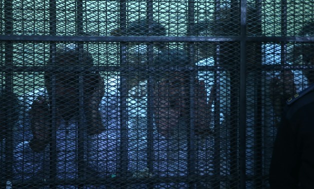 FILE - A number of defendants inside a court's cage - Egypt Today/Ahmed Maarouf