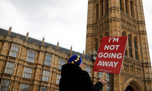 An anti-Brexit protester demonstrates outside the Houses of Parliament in London, Britain, April 3, 2019- Reuters