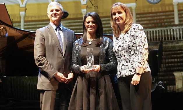 World Travel and Tourism Council CEO Gloria Guevara (R) grants a Global Champion Award to Egypt's Minister of Tourism Rania al-Mashat (M) - Press photo