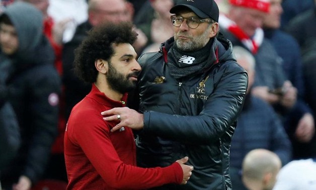 Liverpool manager Juergen Klopp and Liverpool's Mohamed Salah celebrate after their recent Premier League match against Tottenham Hotspur. (Reuters)
