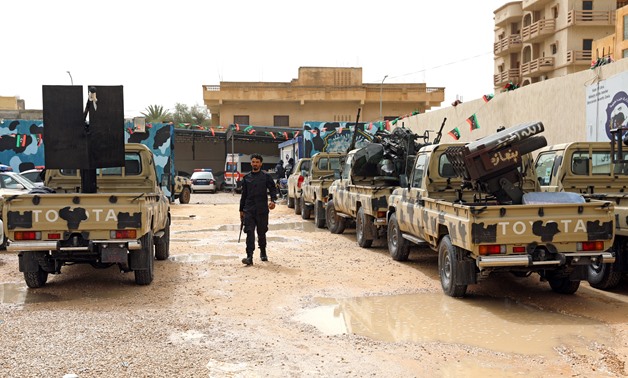 A member of pro-internationally recognised government forces checks the confiscated military vehicles from Libyan commander Khalifa Haftar's troops, in Zawiyah west of Tripoli, Libya 2019. REUTERS/Hani Amara