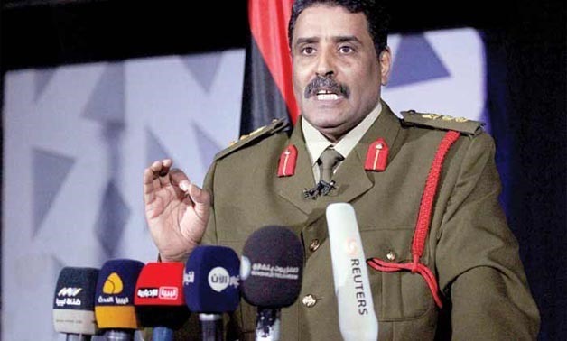 FILE - Libyan Army spokesman, Ahmed al-Mesmari speaks during a news conference in the coastal city of Benghazi - AFP
