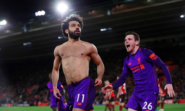 Soccer Football - Premier League - Southampton v Liverpool - St Mary's Stadium, Southampton, Britain - April 5, 2019 Liverpool's MohamedSalah celebrates scoring their second goal with Andrew Robertson Action Images via Reuters/Andrew Couldridge 